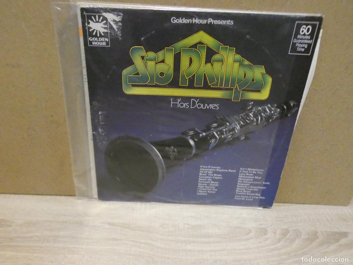 Vinyl records: CAJJ220 TAPA ALGO GASTADA VINILO BUEN ESTADO GOLDEN HOUR OF SYD PHILLIPS