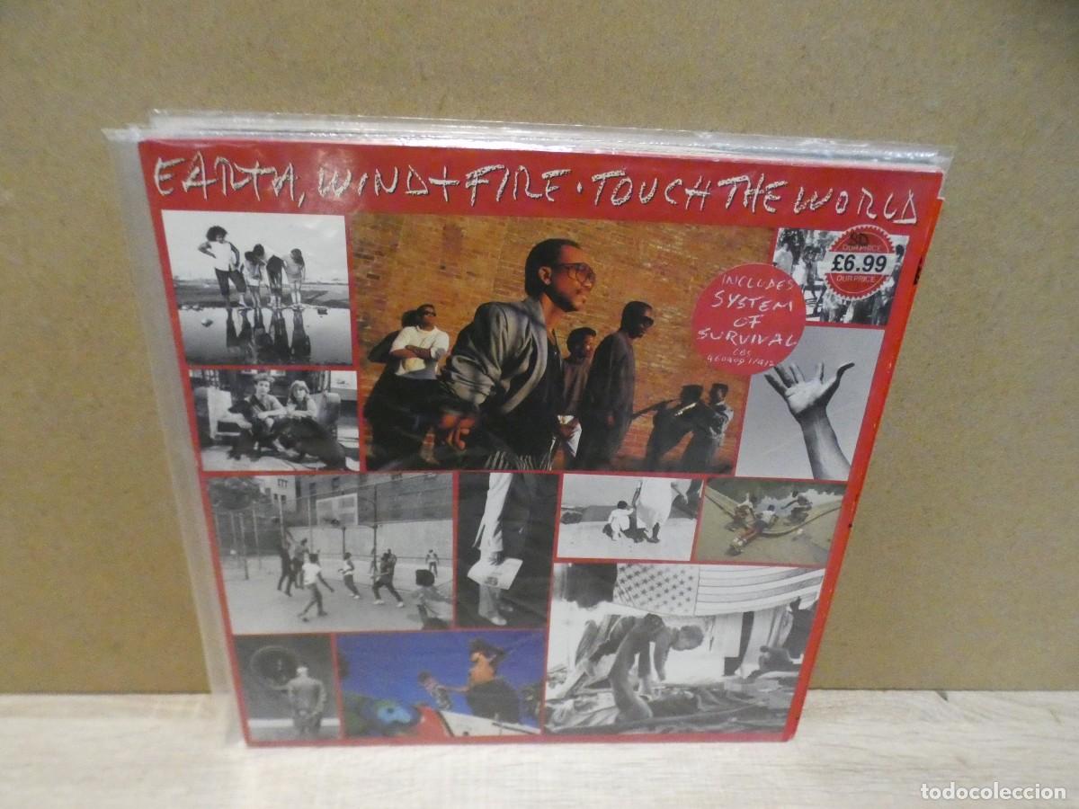 Disques de vinyle: cajj224 lp Eart wind and fire Touch the world una linea fina sentible dedo a tu riesgo