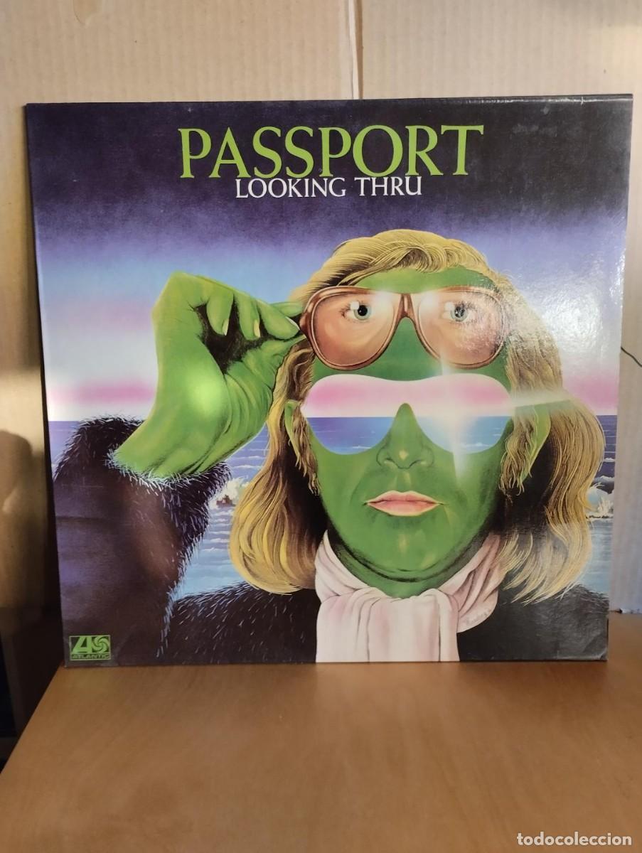Discos de vinilo: PASSPORT ---- LOOKING THRU - Foto 1