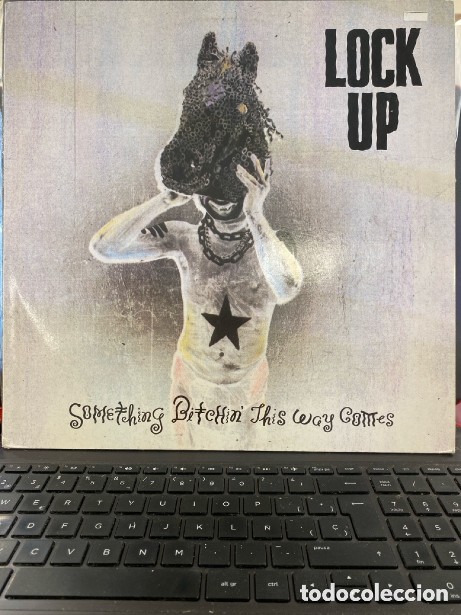 Discos de vinilo: LOCK UP - SOMETHING BITCHIN THIS WAY COMES LP GERMANY - Foto 1