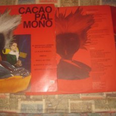 Discos de vinilo: CACAO PAL MONO - EL MISTERIOSO HOMBRE ENCARTE VINILO ROJO (GIRA 1984) OG ESPAÑA