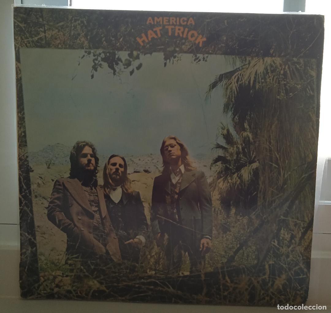 Discos de vinilo: AM&Eacute;RICA : HAT TRICK - Foto 1