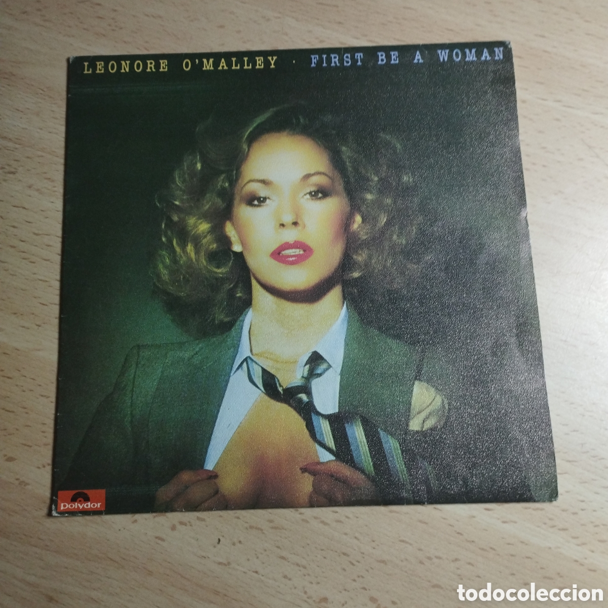 Dischi in vinile: Single 7&rdquo; Leonore O' Malley 1980 First be a woman.