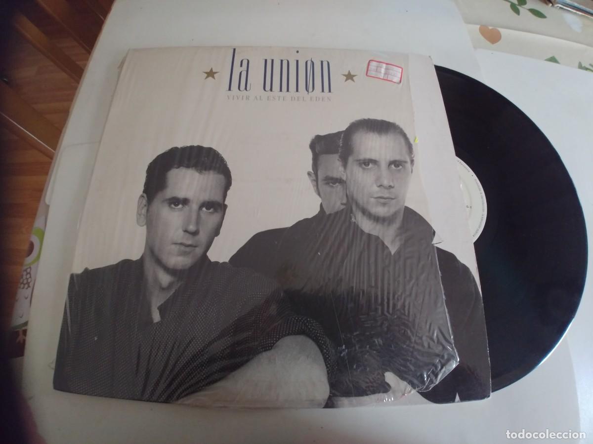 Discos de vinilo: LA UNION-LP VIVIR AL ESTE DEL EDEN-LETRAS - Foto 1
