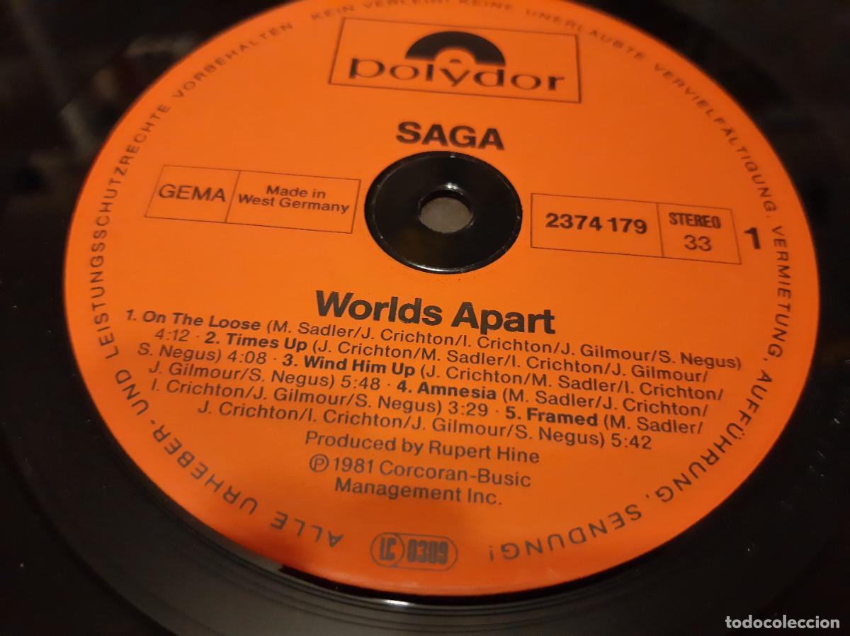 Discos de vinilo: SAGA -WORLDS APART- (1981) LP DISCO VINILO - Foto 2