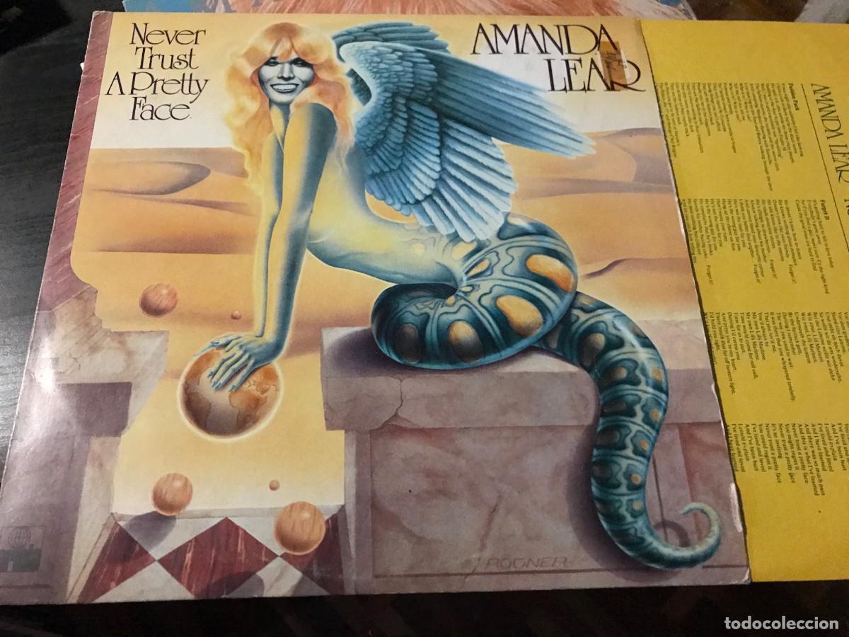 Discos de vinilo: AMANDA LEAR - NEVER TRUST A PRETTY FACE LP ARIOLA 1979 DISCO - Foto 1