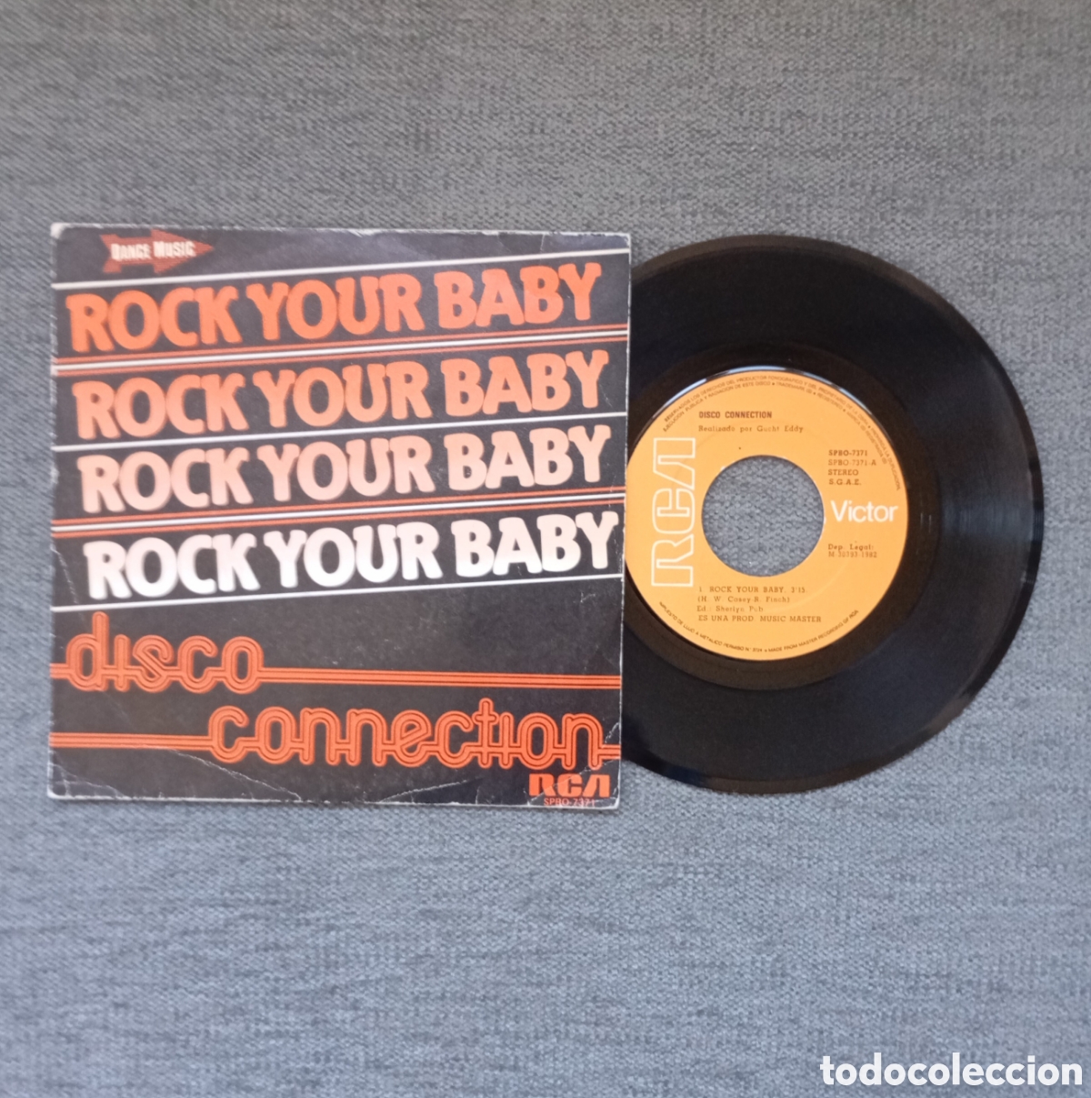 Discos de vinil: Disco Connection. Rock Your Baby/ Rock Your Baby. Single 7&rdquo;, a&ntilde;o 1982.