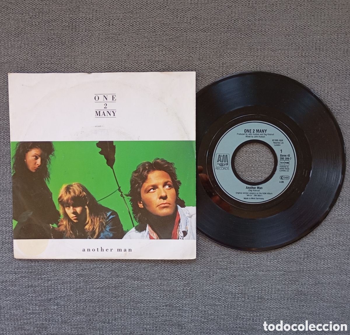 Disques de vinyle: One 2 Many. Another Man/ You're The Reason. Single 7&rdquo;, a&ntilde;o 1988.