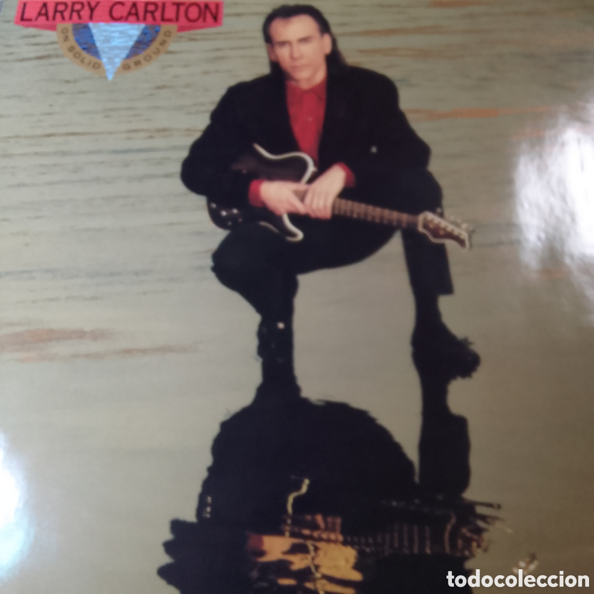 Discos de vinilo: LARRY CARLTON ON SOLID GROUND - Foto 1