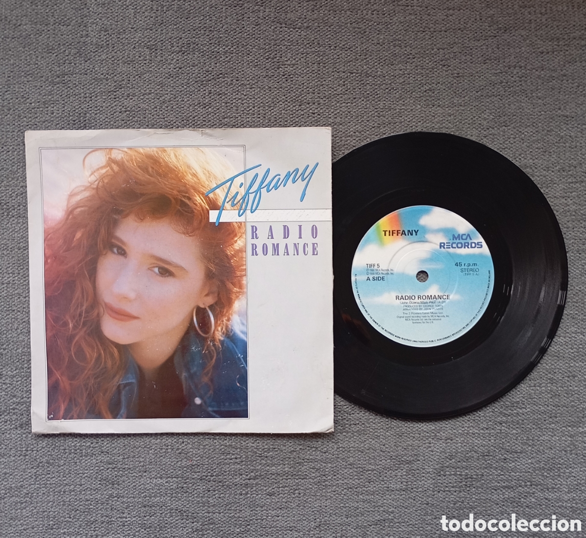 Discos de vinil: Tiffany. Radio Romance/ Can't Stop A Heartbeat. Single 7&rdquo;, a&ntilde;o 1988.