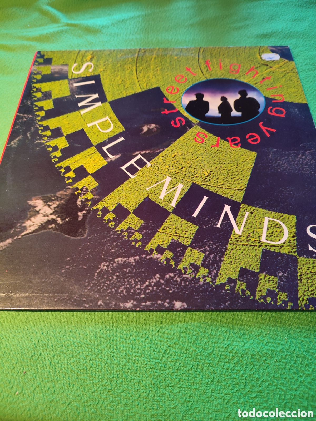 Discos de vinilo: Simple Minds - Streets fighting years - Foto 1