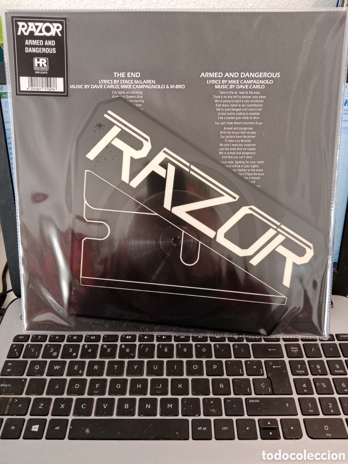 Discos de vinilo: Razor - Armed and dangerous (shaped picture disc) - Foto 1