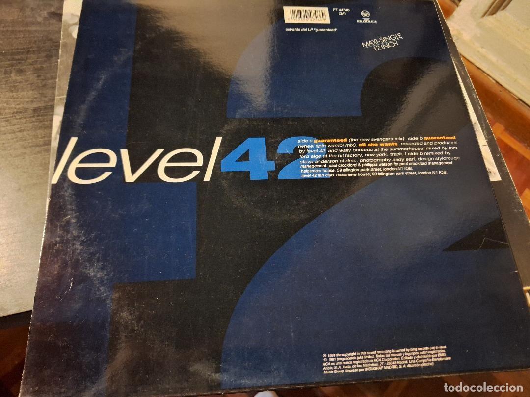 Discos de vinilo: LEVEL 42 - GUARANTEED 12&rdquo; MAXI RCA 1991 SYNTH POP - Foto 2