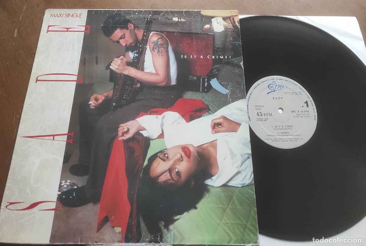 Discos de vinilo: SADE - IS IT A CRIME?-MAXI-ESPA&Ntilde;A- - Foto 1
