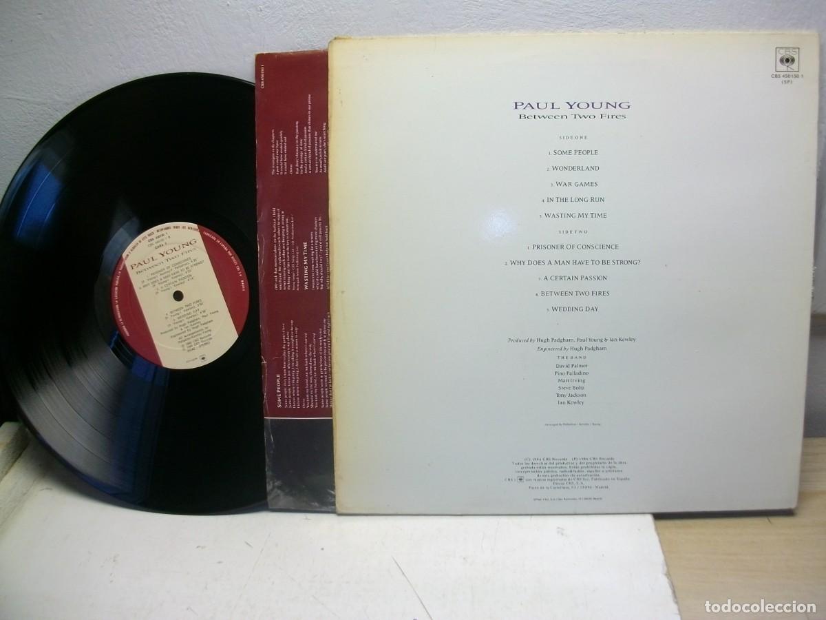 Discos de vinilo: Paul Young &ndash; Between Two Fires LP - Foto 2