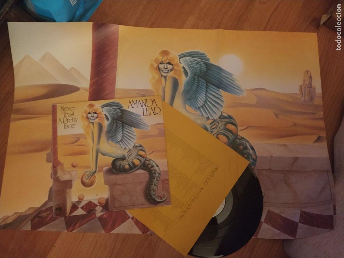 Discos de vinilo: AMANDA LEAR, NEVER TRUST A PRETTY FACE, LP original con encarte y poster - Foto 1
