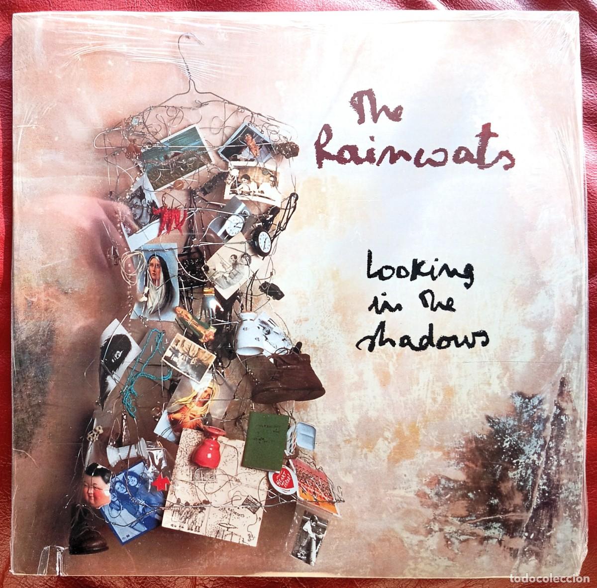 Discos de vinilo: THE RAINCOATS - LOOKING IN THE SHADOWS LP - Foto 1