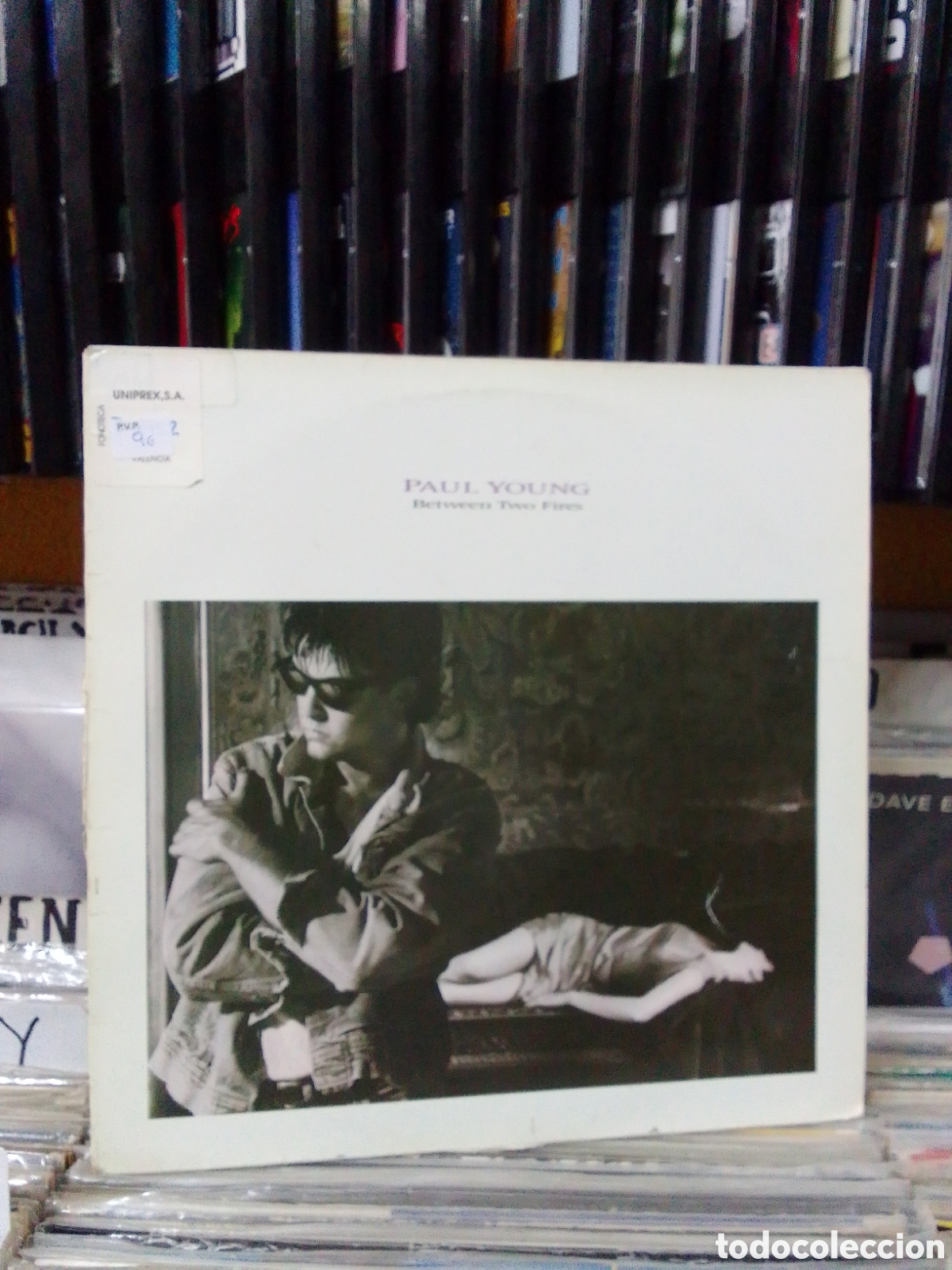 Discos de vinilo: Paul young between two fires - Foto 1