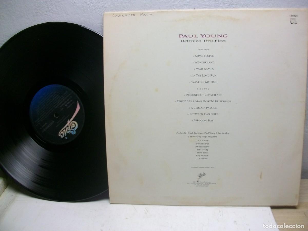 Discos de vinilo: Paul Young &ndash; Between Two Fires LP - Foto 2