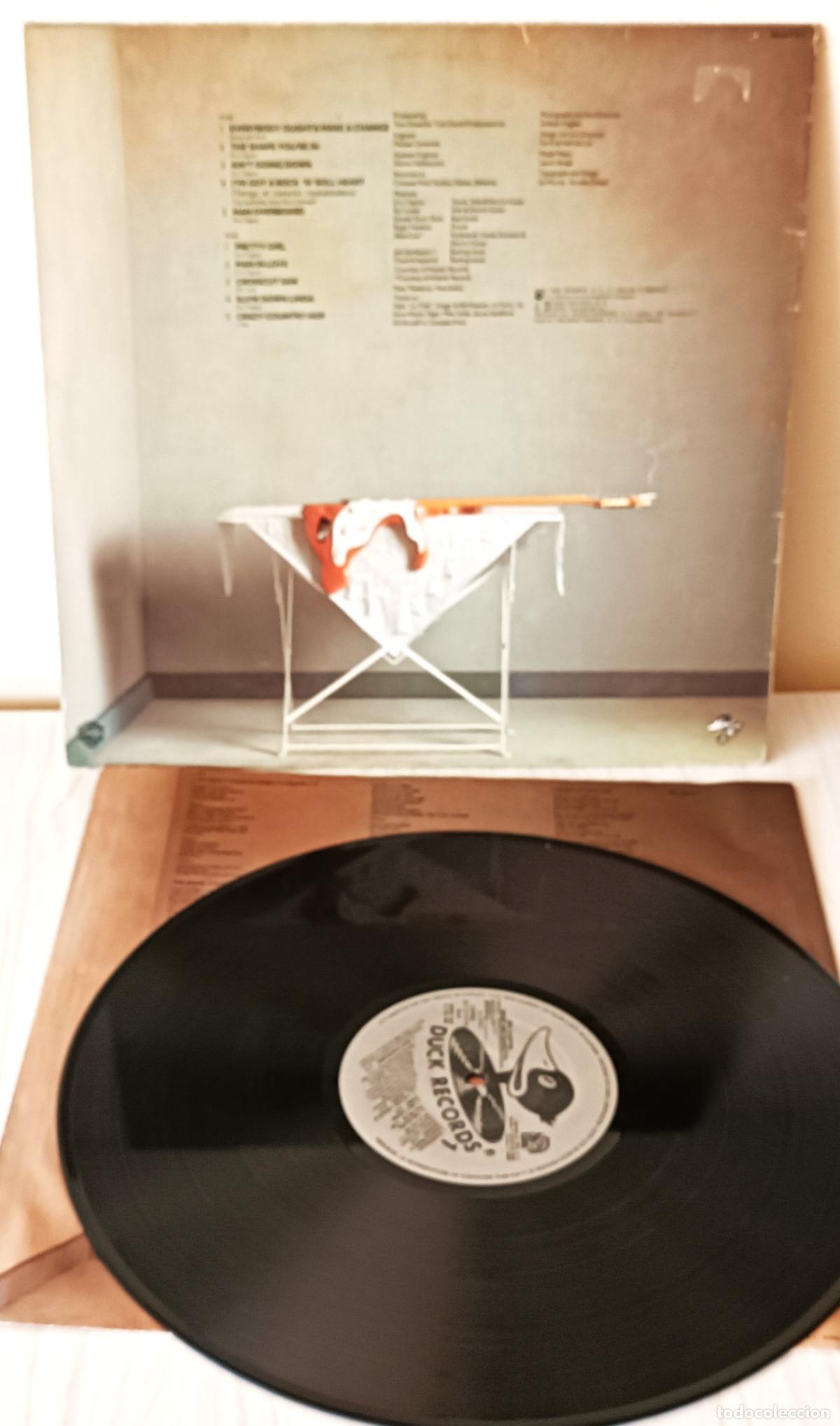 Discos de vinilo: ERIC CLAPTON - MONEY AND CIGARETTES DUCK - 1983 - Foto 2