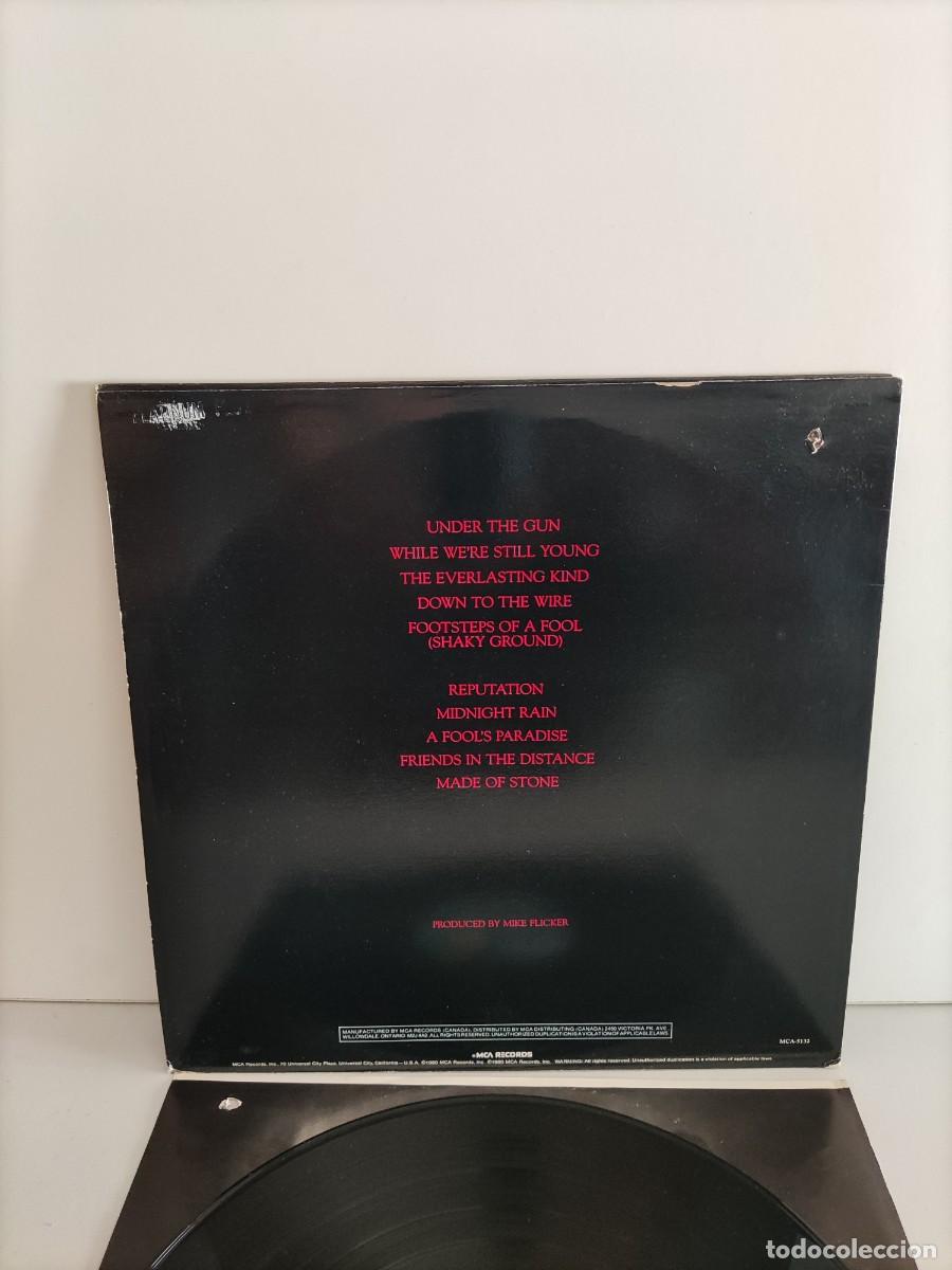 Discos de vinilo: LP 367 Poco - Under the gun 1980 (Disco como nuevo) - Foto 2