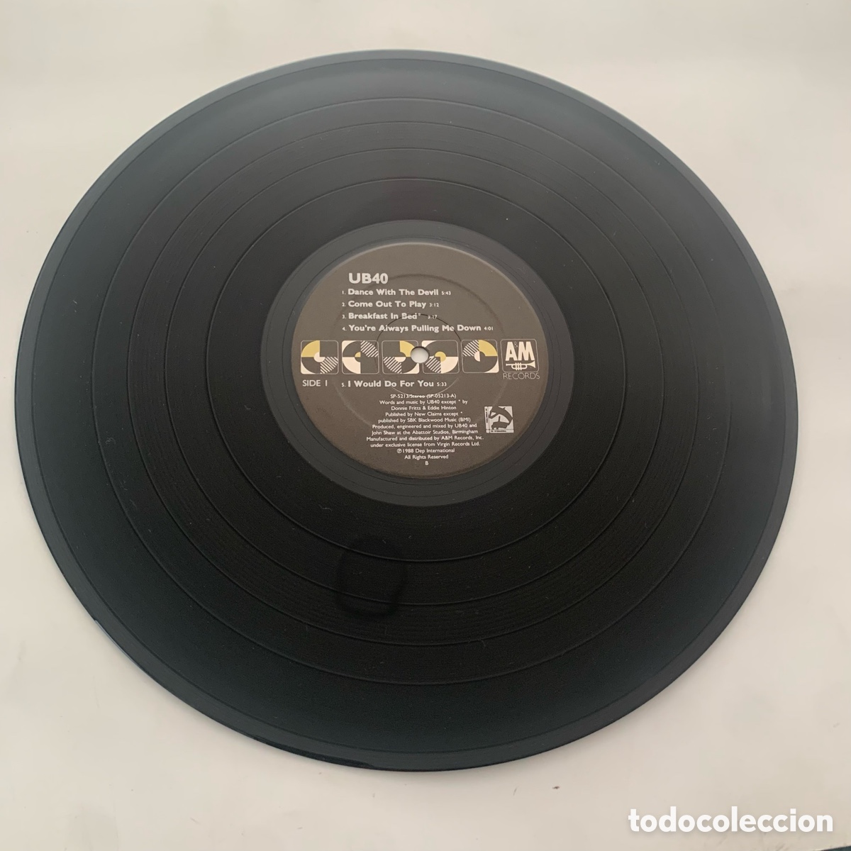 Discos de vinilo: lp ub40 edicion USA de 1988 - Foto 6