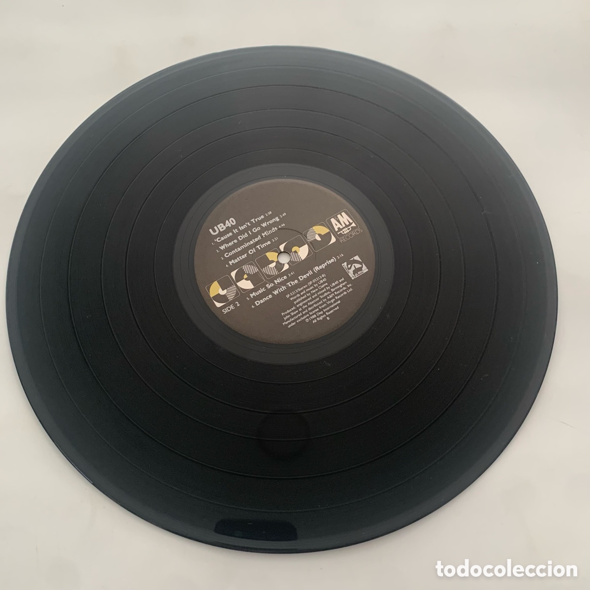 Discos de vinilo: lp ub40 edicion USA de 1988 - Foto 7