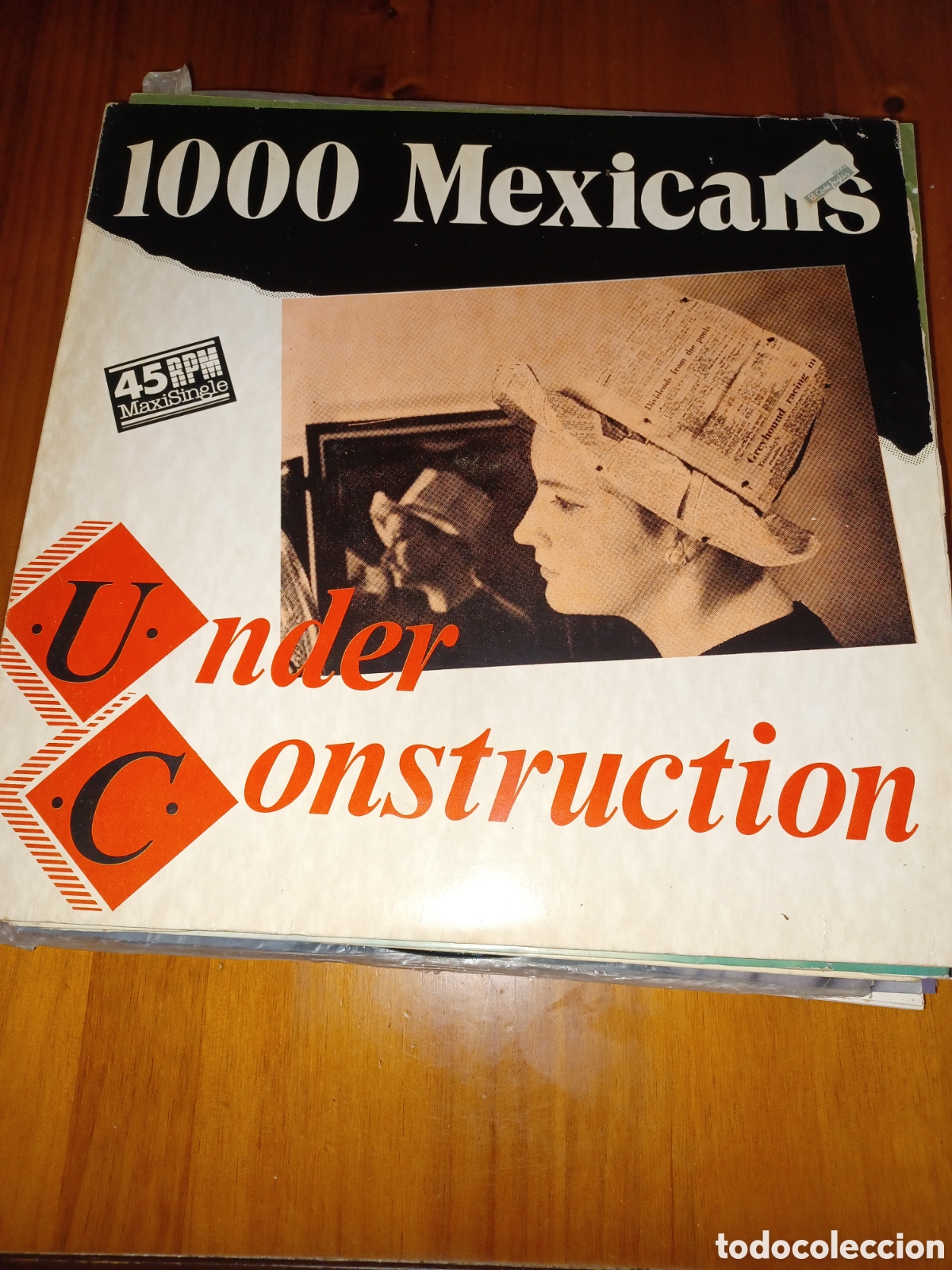 Discos de vinilo: Maxisingle 1000 mexicans under construction - Foto 1