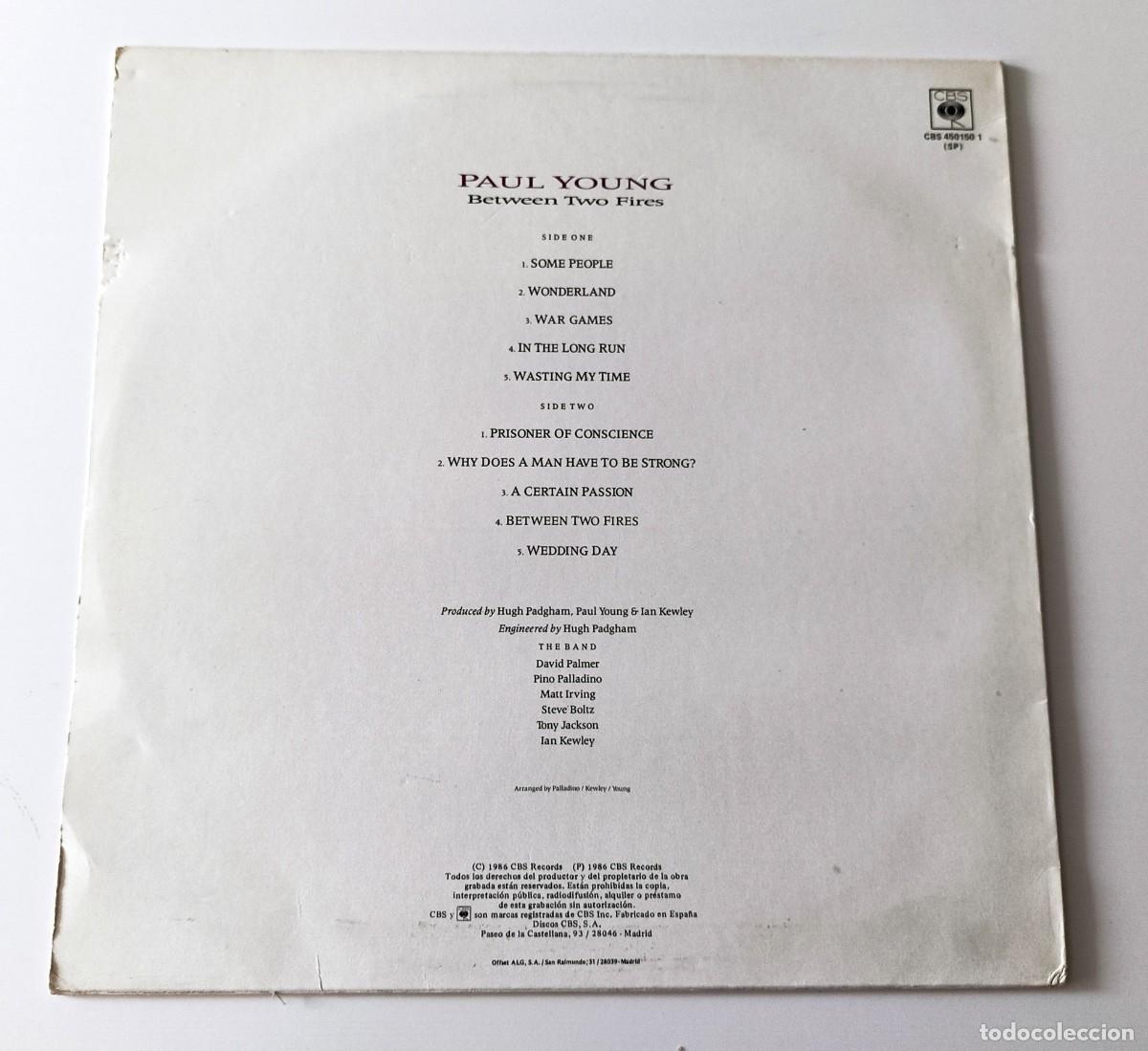 Discos de vinilo: LP PAUL YOUNG - BETWEEN TWO FIRES - Foto 2
