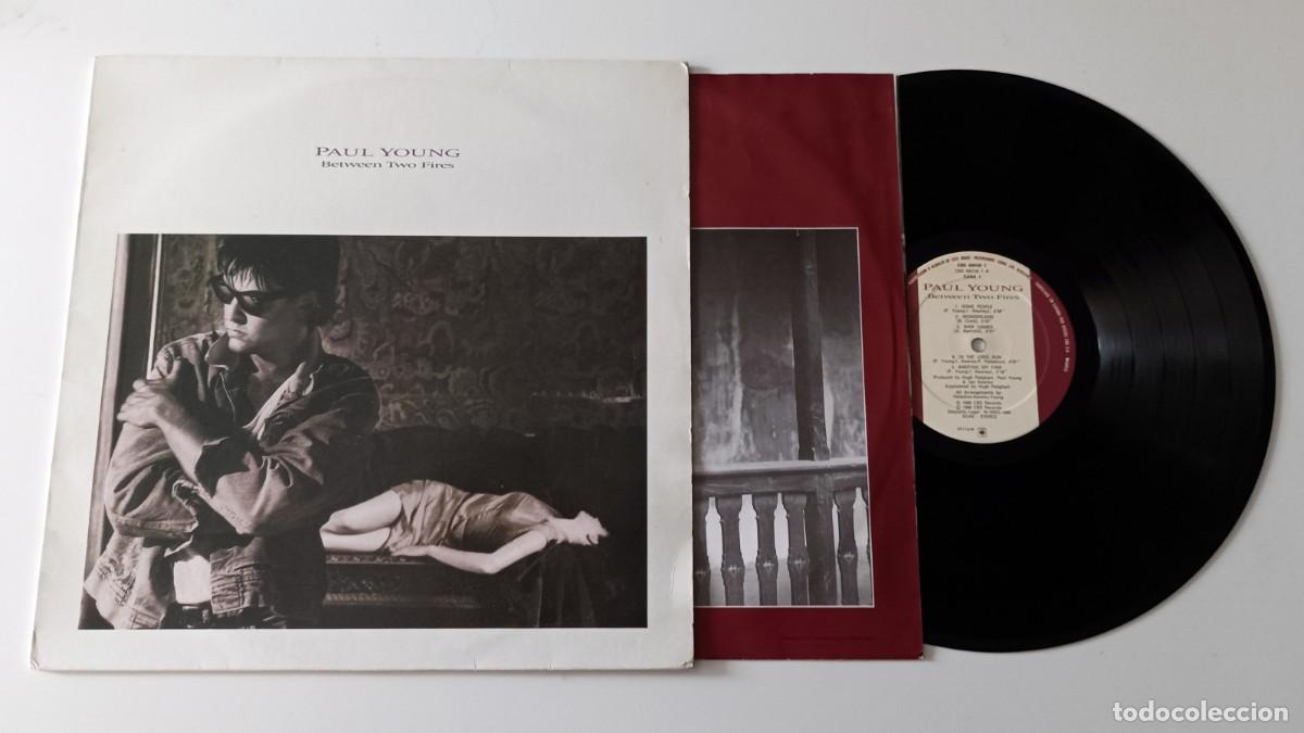 Discos de vinilo: LP PAUL YOUNG - BETWEEN TWO FIRES - Foto 3