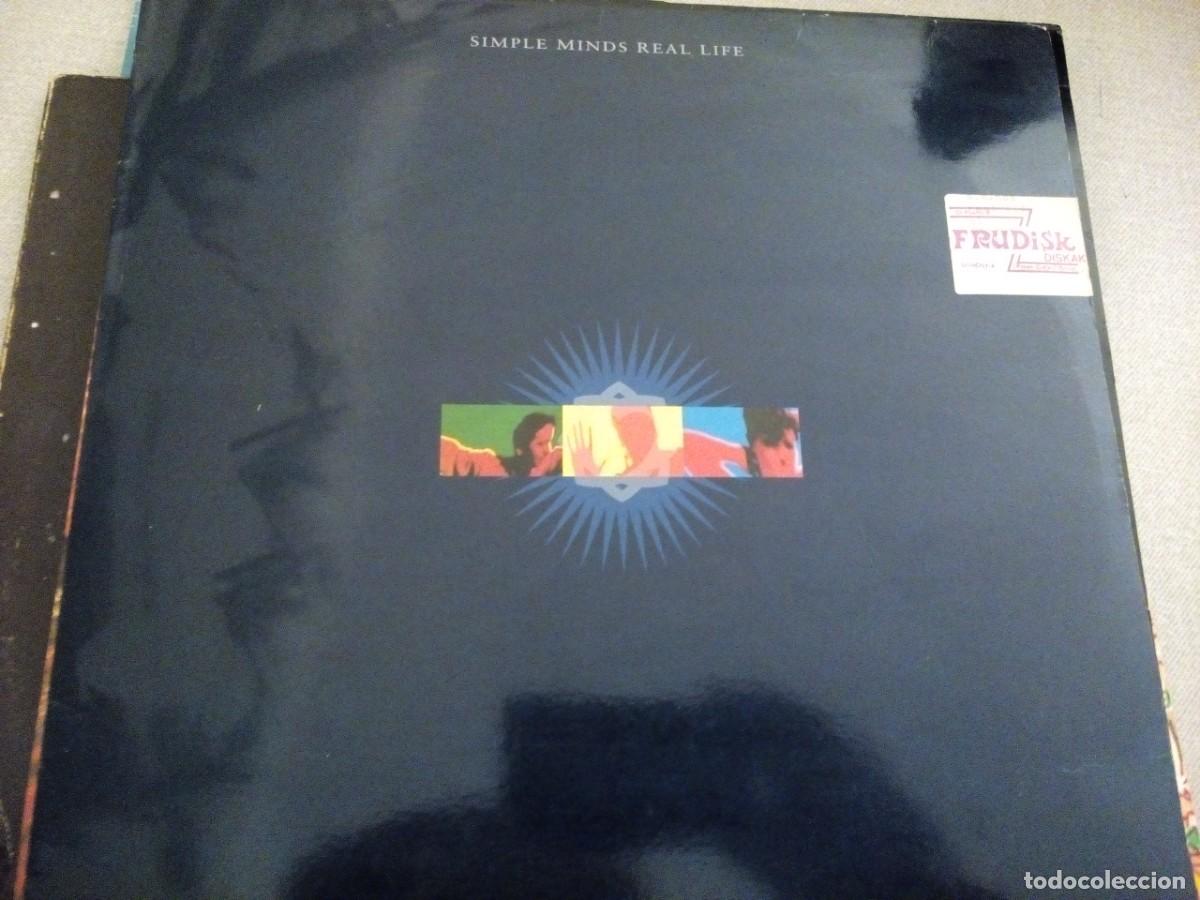 Discos de vinilo: SIMPLE MINDS REAL LIFE LP CON INSERTO SPAIN - Foto 1