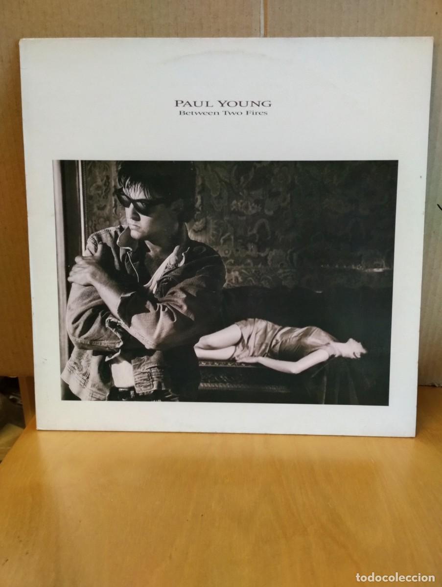 Discos de vinilo: PAUL YOUNG ----- BETWEEN TWO FIRES - Foto 1