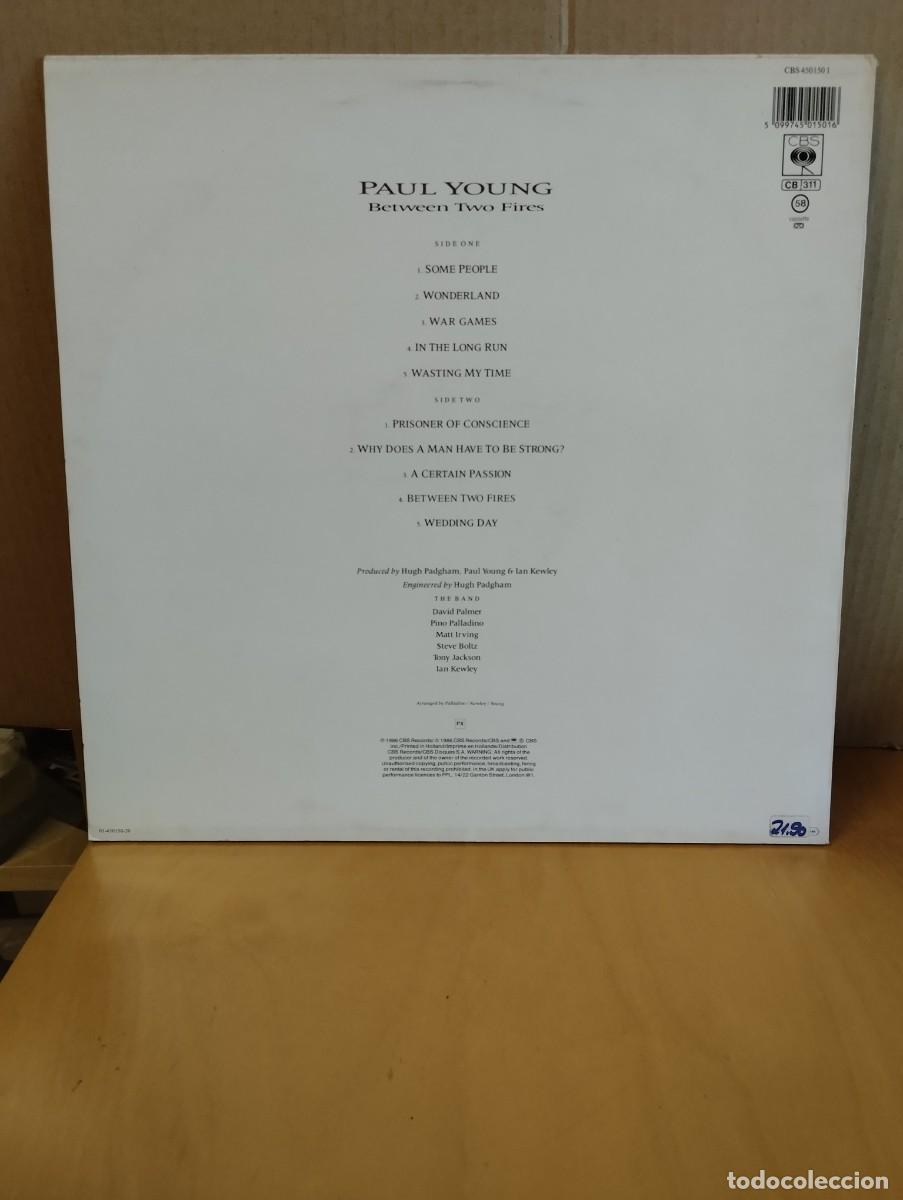 Discos de vinilo: PAUL YOUNG ----- BETWEEN TWO FIRES - Foto 2