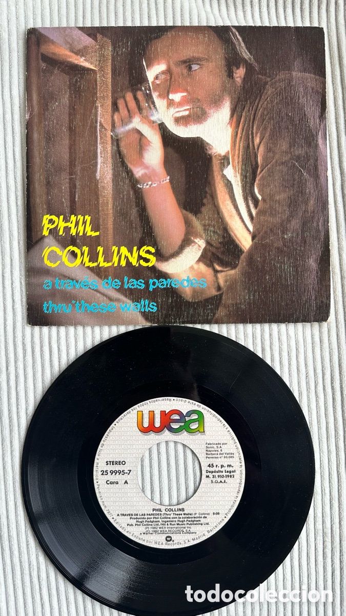 Discos de vinilo: PHIL COLLINS SG. A TRAV&Eacute;S DE LAS PAREDES. SPAIN - Foto 1