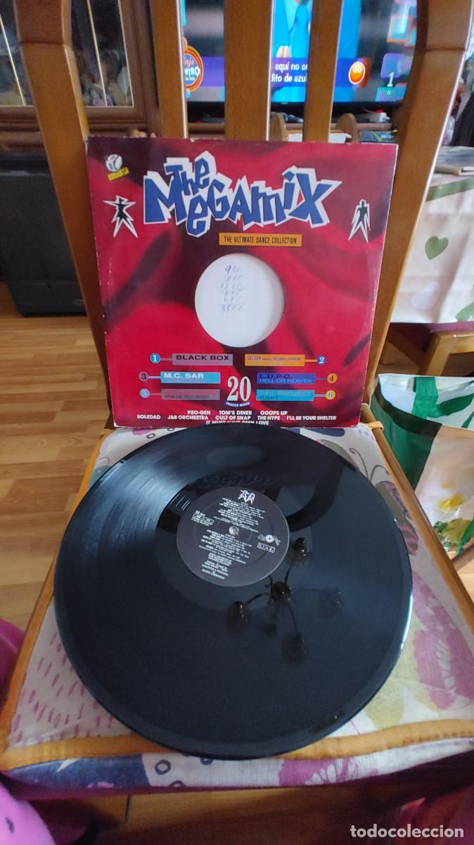 Discos de vinilo: THE MEGAMIX-MAXI THE ULTIMATE DANCE COLLECTION - Foto 1
