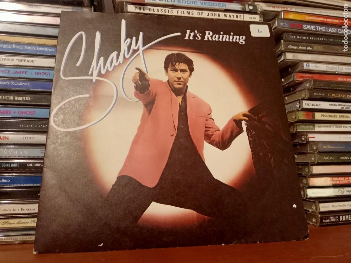 Discos de vinilo: Shakin Stevens &lrm;&ndash; Its Raining - simple UK 1981 - Foto 1