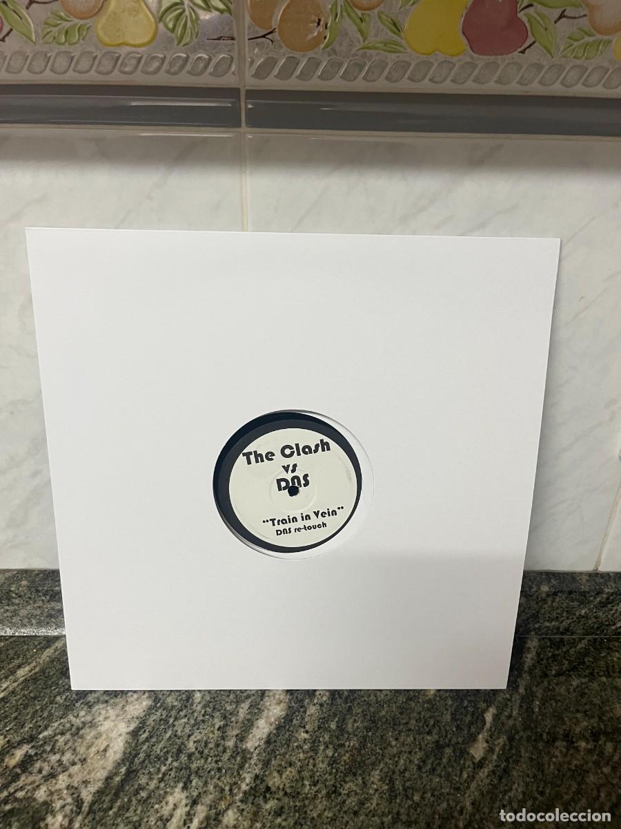 Discos de vinilo: The Clash Vs. Dns Train In Vein - Foto 1