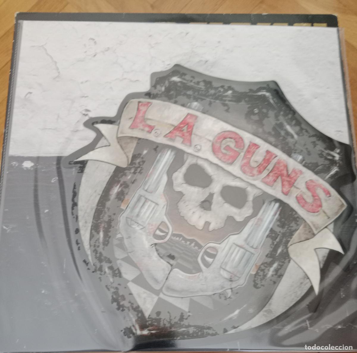 Discos de vinilo: LA Guns - Knock me down single shaped - Foto 1