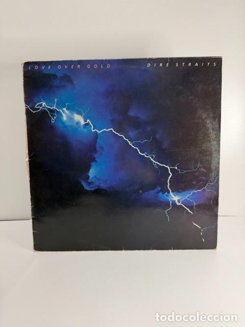 Discos de vinilo: DIRE STRAITS (LP) LOVE OVER GOLD - A&Ntilde;O 1982 - ENCARTE CON LETRAS