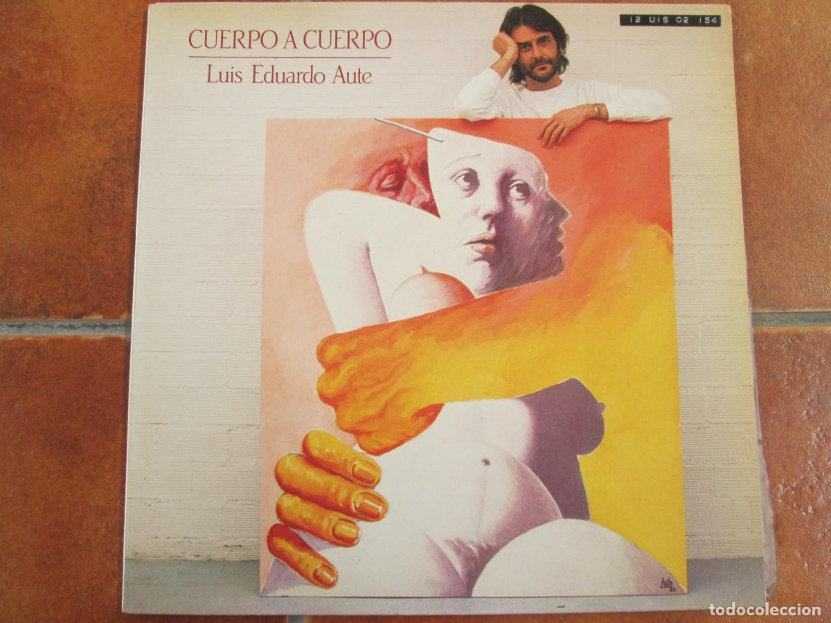 Discos de vinilo: LUIS EDUARDO AUTE - Cuerpo a Cuerpo. LP, ed espa&ntilde;ola 12&rdquo; 1984. P&oacute;ster. impecable (NM)
