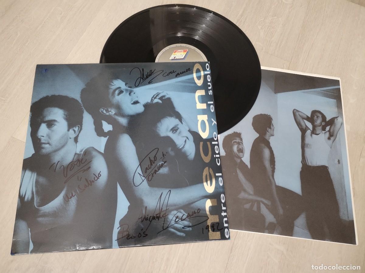 Discos de vinilo: MECANO - ENTRE EL CIELO Y EL SUELO ..LP DE 1986 - ARIOLA CON LETRAS .. FIRMADO POR EL GRUPO.