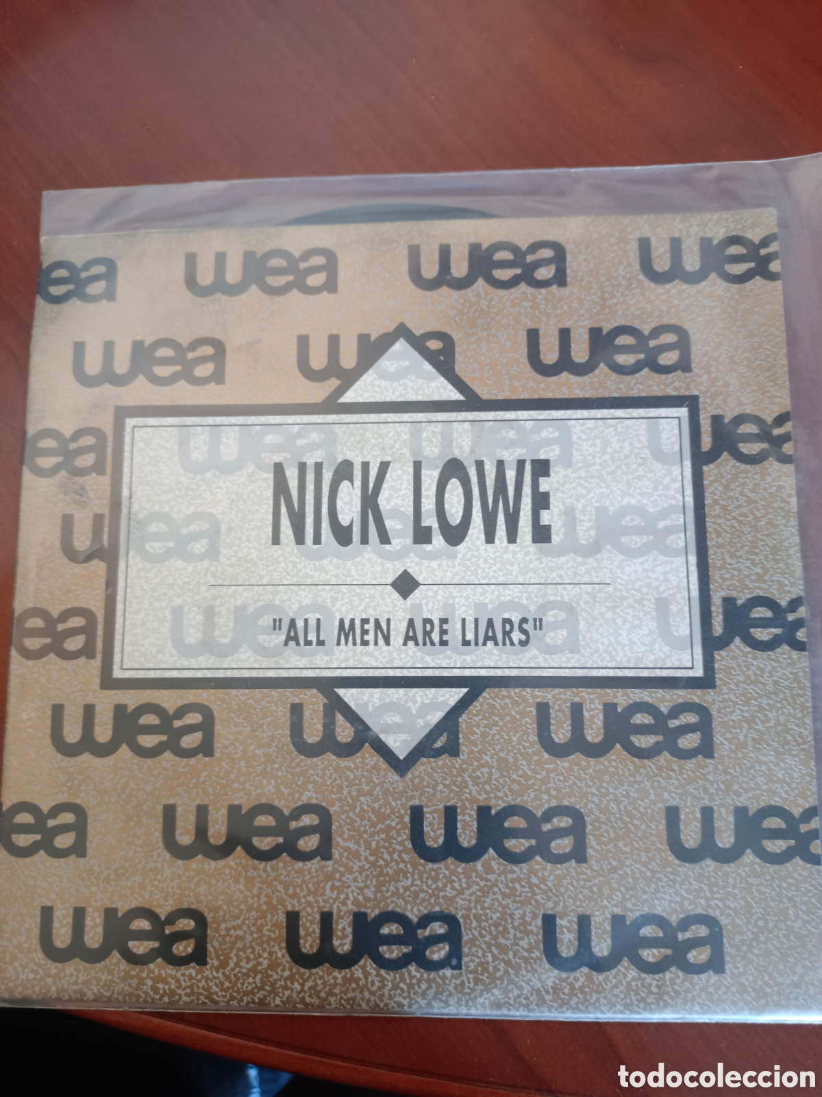 Discos de vinilo: SINGLE NICK LOWE - ALL MEN ARE LIARS - WEA ESPA&Ntilde;A 1990 - PROMO. EXCELENTE ESTADO.