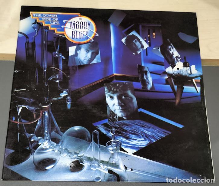 Discos de vinilo: The Moody Blues &lrm;- The Other Side Of Life - LP Polydor &lrm;ref. 829179-1. Ed. espa&ntilde;ola 1986.
