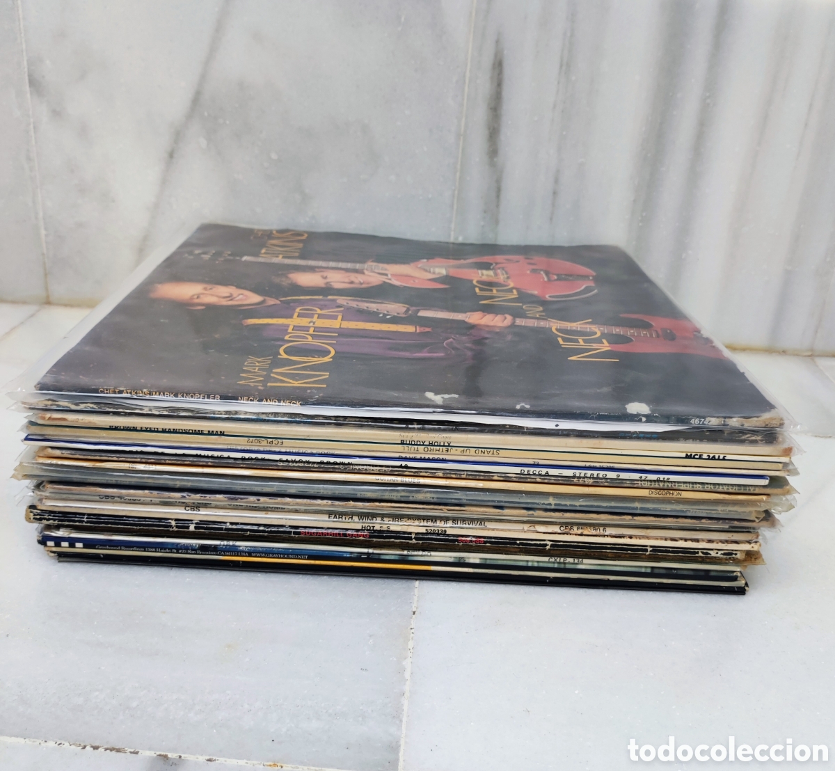 Discos de vinilo: 24 VINILOS LP - MARK KNOPFLER, EMERSON LAKE & PALMER, JETHRO TULL, DIRE STRAITS, BUDDY HOLLY, ETC...