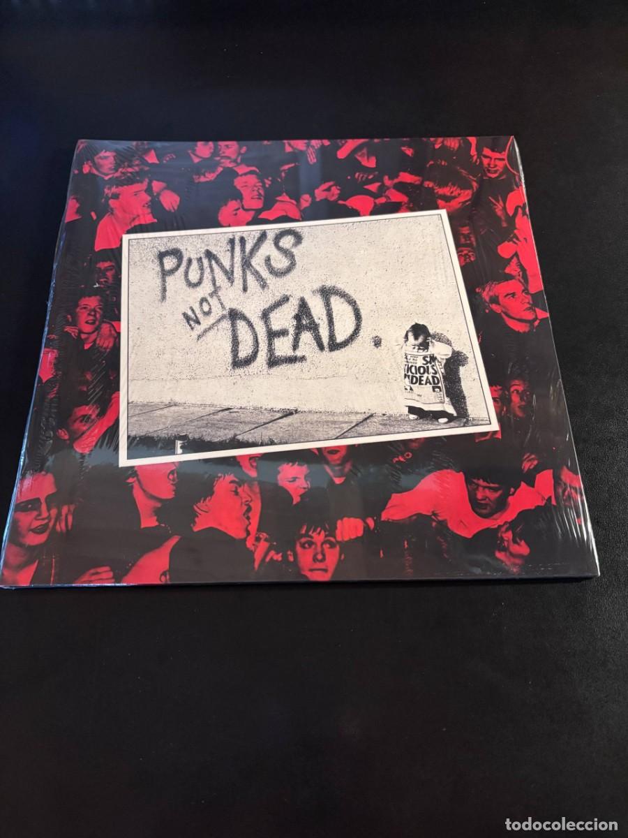 Discos de vinilo: The Exploited Punks Not Dead Disco de vinilo rojo y negro splatter LP punk oi!