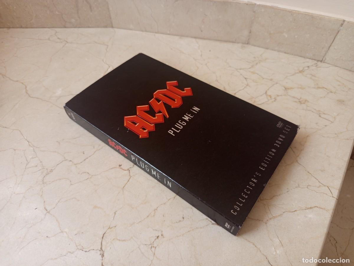 Discos de vinilo: AC/DC &ndash; Plug Me In - Caja edici&oacute;n 3 DVD con pases poster y libreto