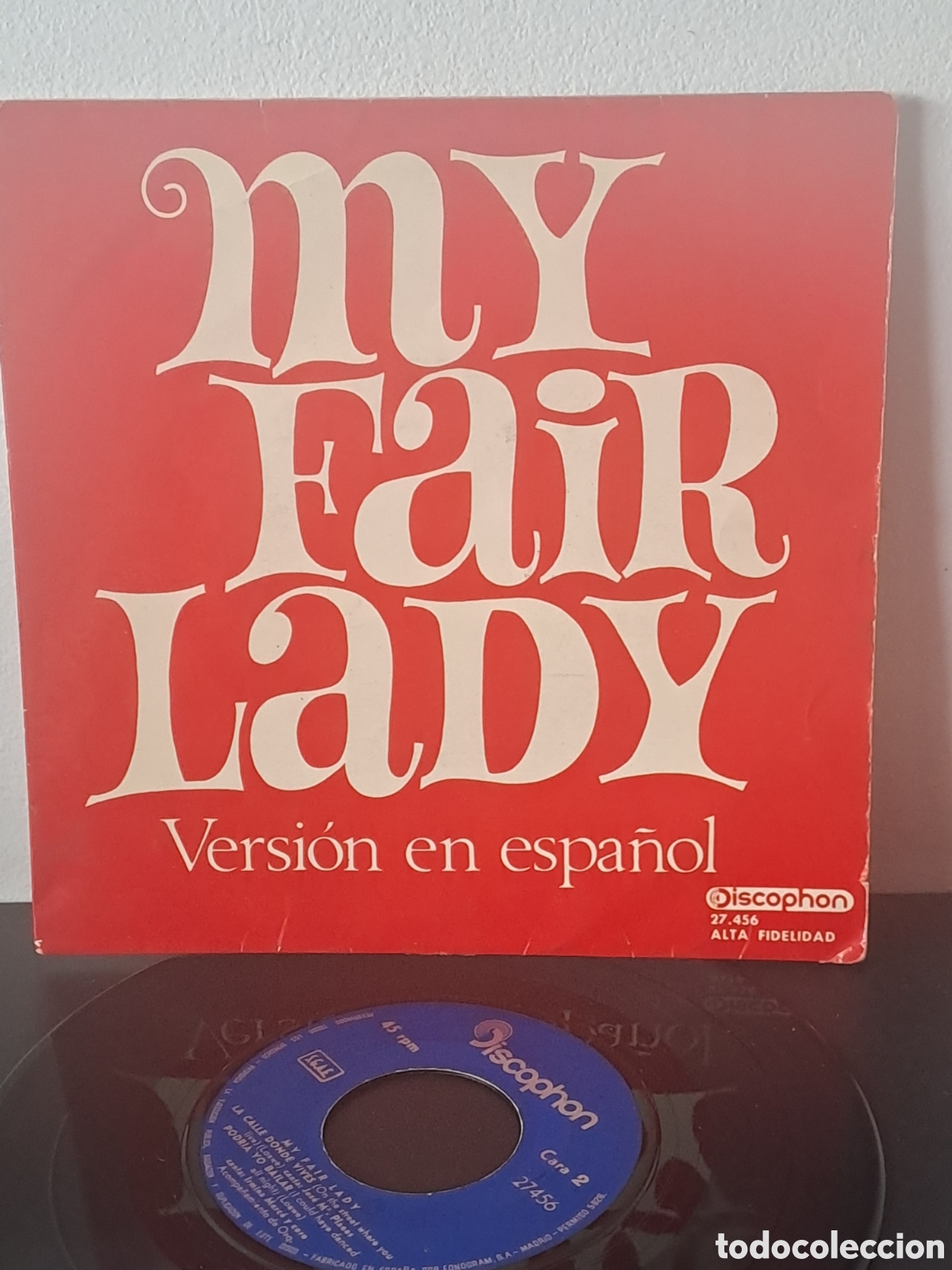 Discos de vinilo: My Fair Lady (Versi&oacute;n en espa&ntilde;ol) ​Sello: Discophon &lrm;&ndash; 27.456 ​Formato: Vinyl, 7&rdquo;, 45 RPM, EP, LGS.6