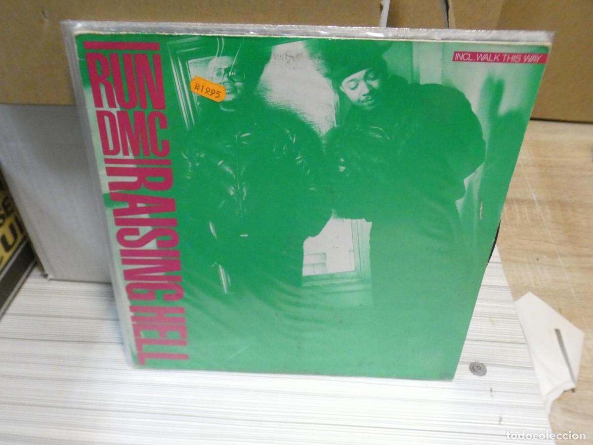 Discos de vinilo: ARKANSAS1980 LOTT713 VINILO LEVE USO AUN CORRECTO RUN DMC RAISING HELL