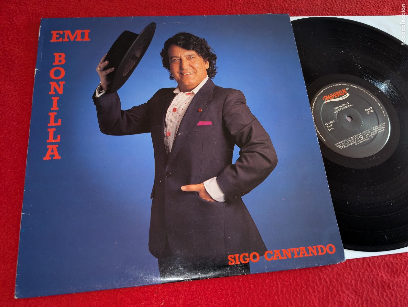Discos de vinilo: EMI BONILLA Sigo cantando LP 1990 Passion VINILO
