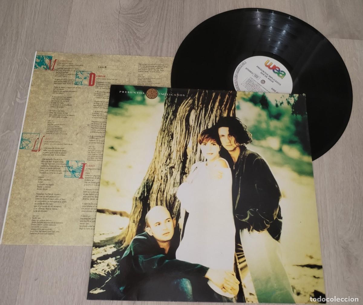 Discos de vinilo: PRESUNTOS IMPLICADOS - SER DE AGUA ..LP 1991 CON LETRAS - WARNER MUSIC - CON 12 MARAVILLOSOS TEMAS